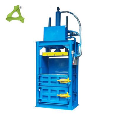 Vertical hydraulic baler